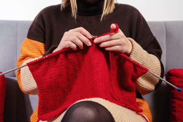 Add a few bright balls of yarn and a pair of knitting needles to your Christmas list (Alamy/PA)