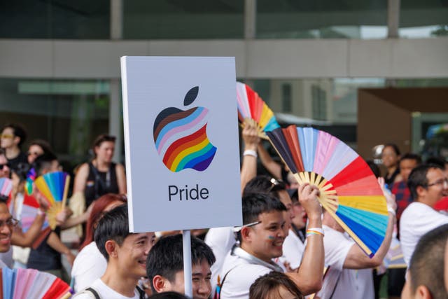 <p>Participants in Bangkok Pride Festival parade the Apple logo on 1 June, 2025, in Bangkok, Thailand</p>