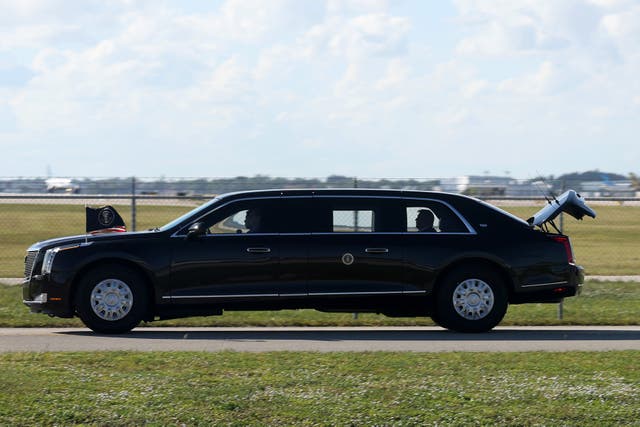 <p>President Donald Trump is driven in his limousine, "The Beast," with the trunk open on November 9, 2025 at Palm Beach International Airport in West Palm Beach, Florida</p>