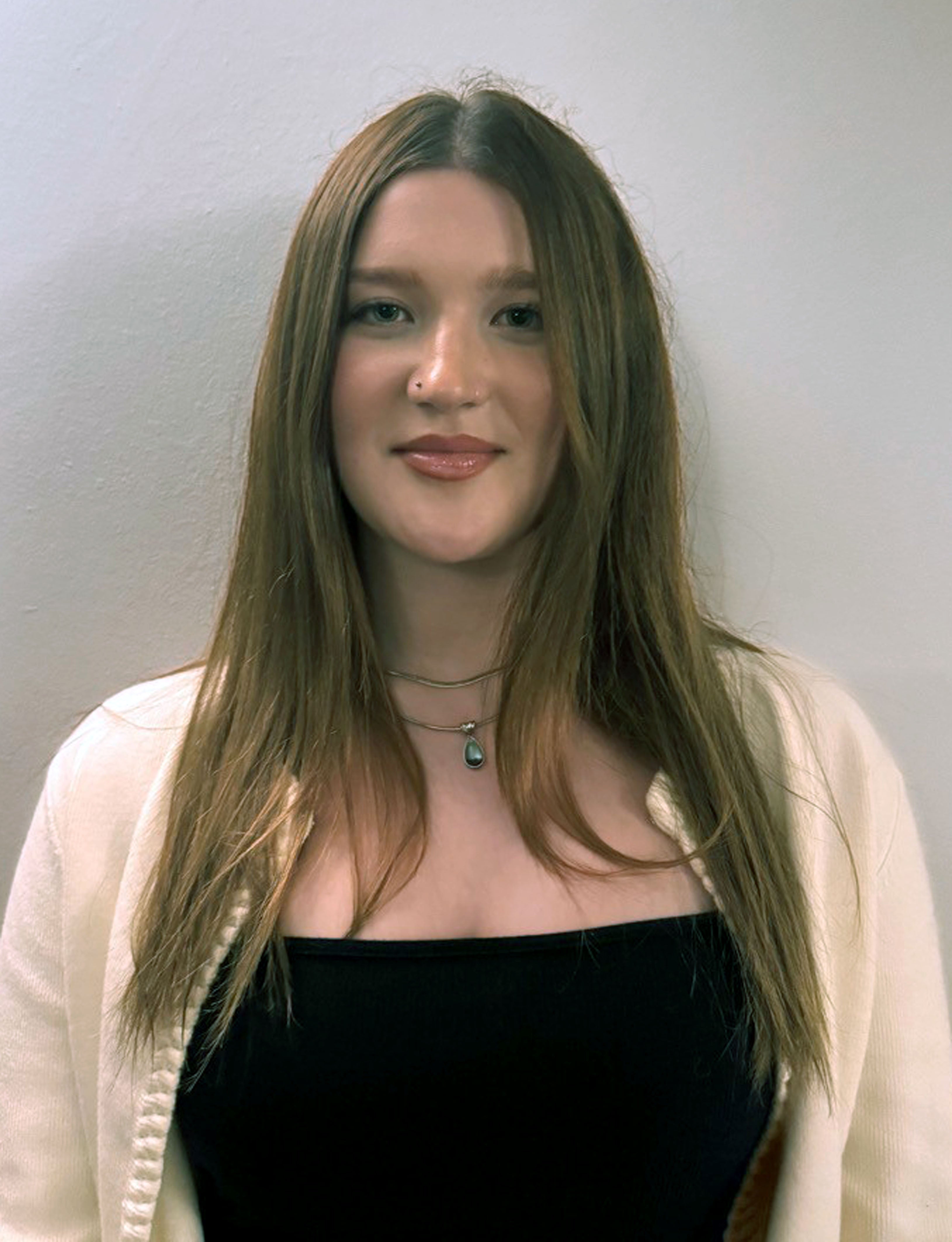 <p>Flossie McShea, 17 from Devon, who has joined a mother-of-three and two fathers seeking to legally challenge government guidance on phones in schools</p>