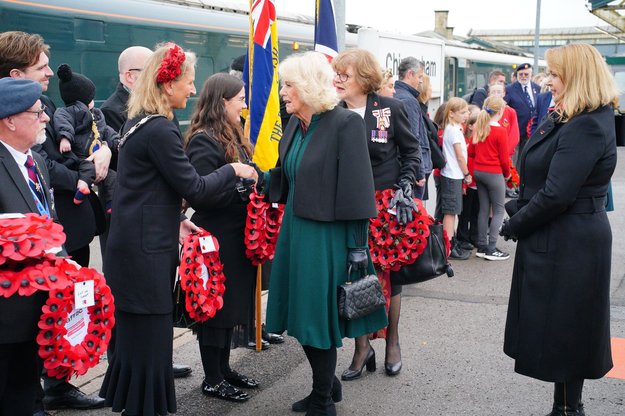 <p>Queen Camilla at London Paddington train station as part of the Great Western Railway 'Poppies to Paddington' event to mark Armistice Day</p>