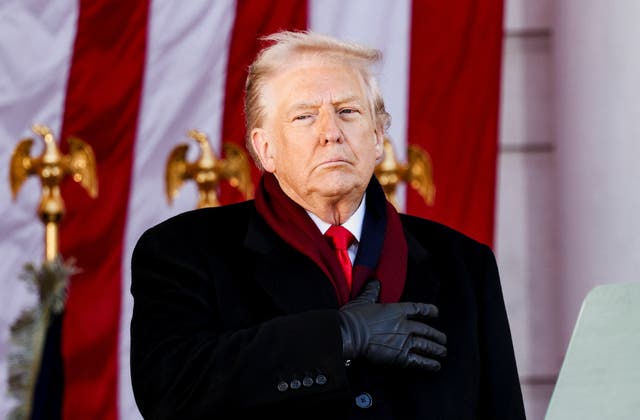 President Donald Trump with his hand over his heart at Arlington National Cemetery