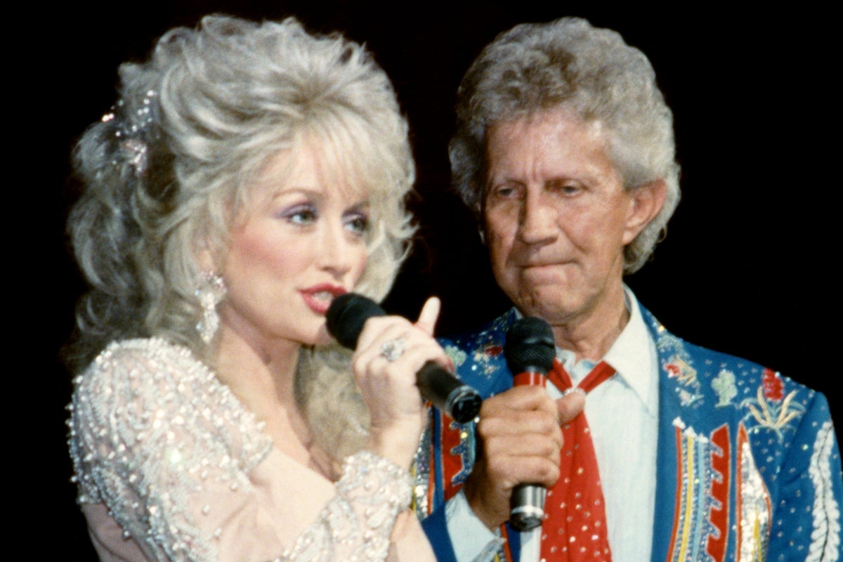 Dolly Parton says mentor Porter Wagoner saw her rise as a ‘threat’ Dolly Parton says mentor Porter Wagoner saw her rise as a ‘threat’