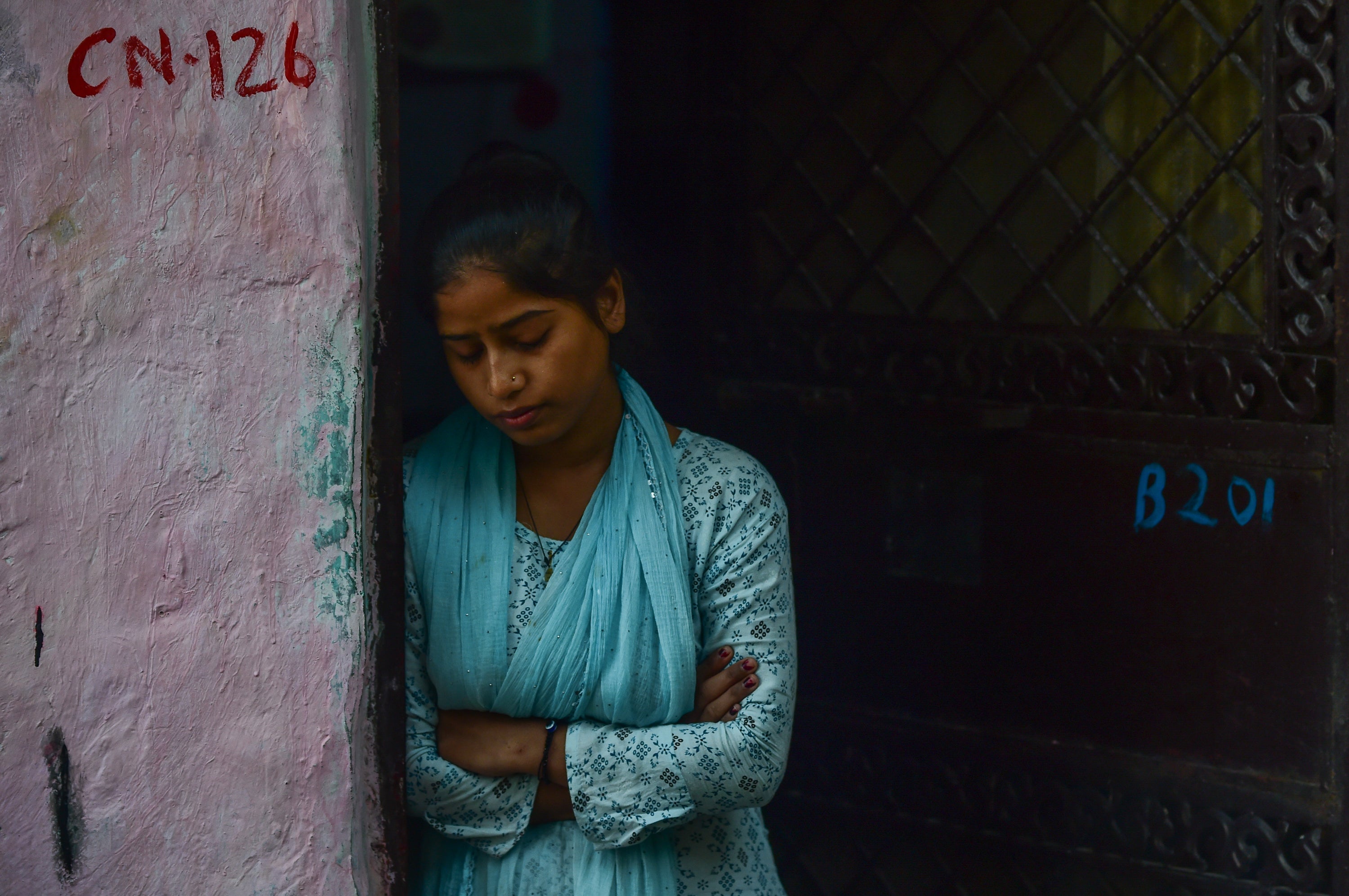 Sister of Pankaj, a victim of the car explosion, mourns after his funeral in Delhi, India, on 11 November 2025
