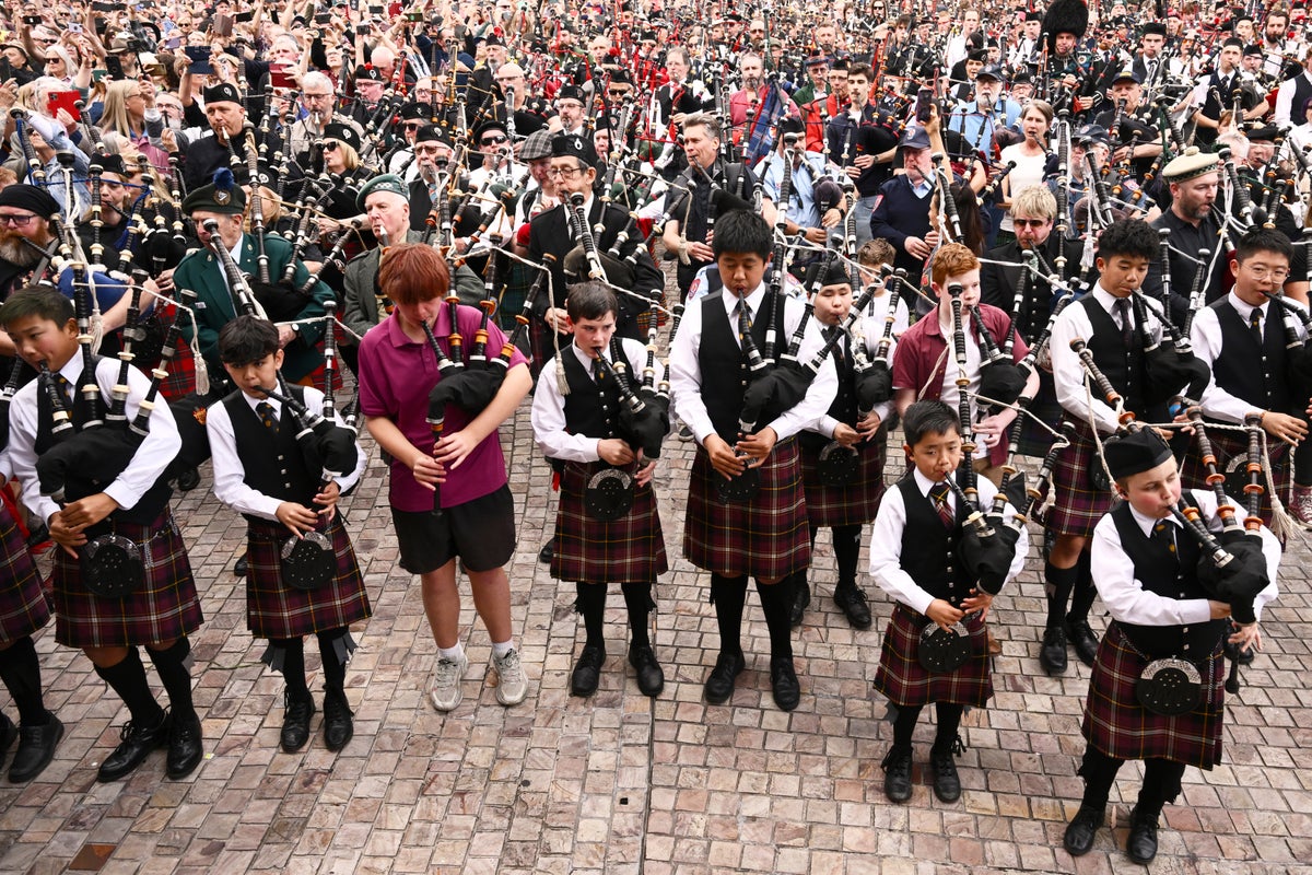Hundreds of bagpipers smash world record with rendition of AC/DC rock classic