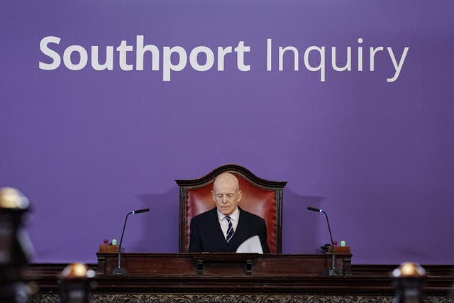Southport Inquiry chairman Sir Adrian Fulford inside the hearing room at Liverpool Town Hall (Peter Byrne/PA)