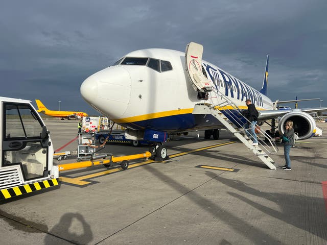 <p>Going places: Passengers preparing for a Ryanair flight from its main base, London Stansted to Baden-Baden in Germany</p>