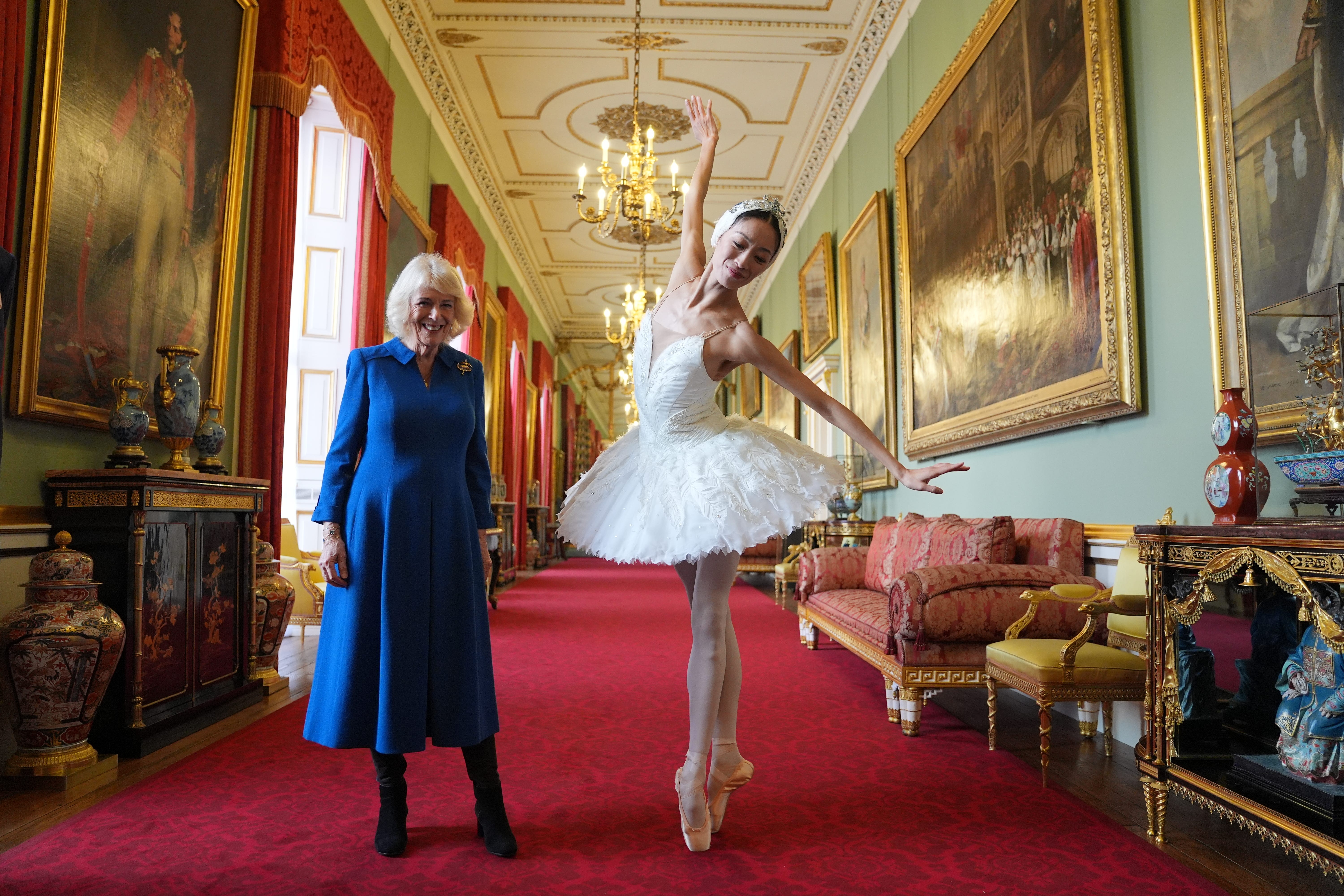 Camilla, patron of the English National Ballet, and ballerina Sangeun Lee, during a reception with English National Ballet staff, dancers and supporters to celebrate the company’s 75th anniversary (Yui Mok/PA)