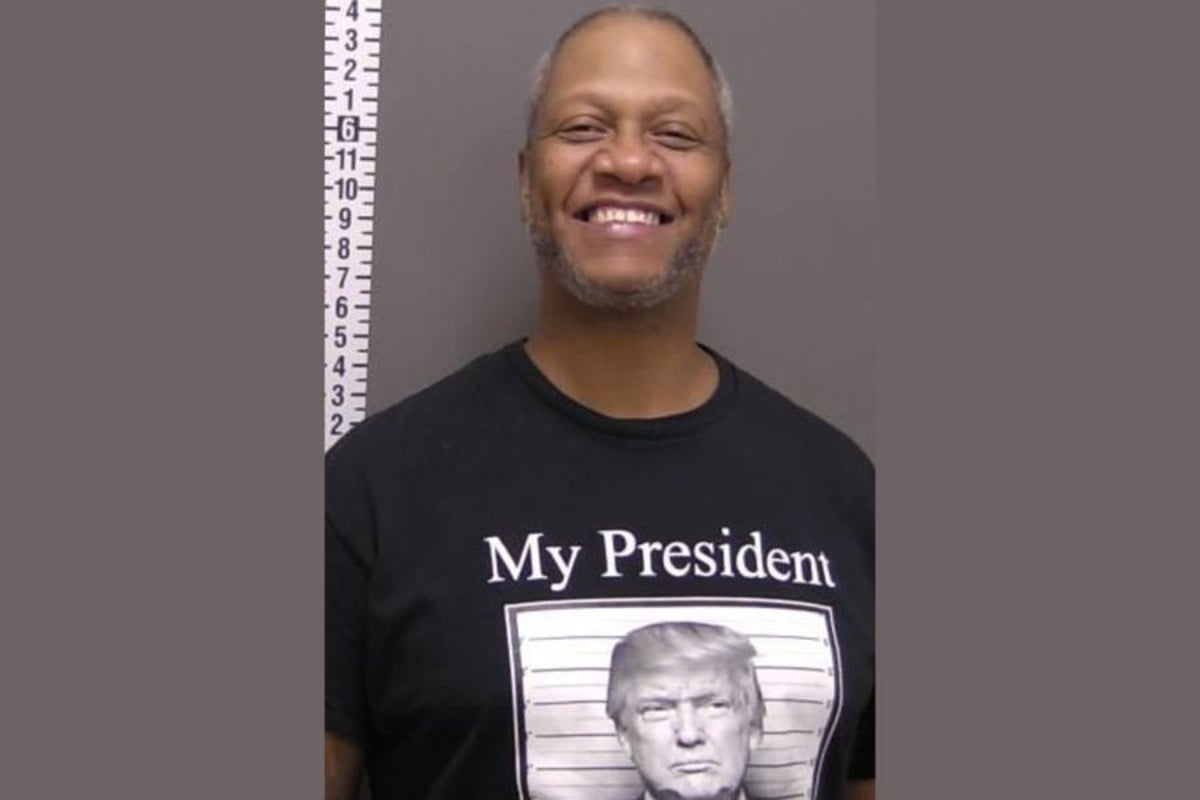 Man charged in drug case smiles proudly after arrest while wearing Trump mugshot T-shirt