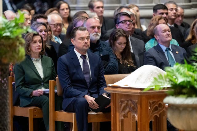 <p>Leonardo DiCaprio sitting next to Nancy Pelosi at Jane Goodall's funeral</p>