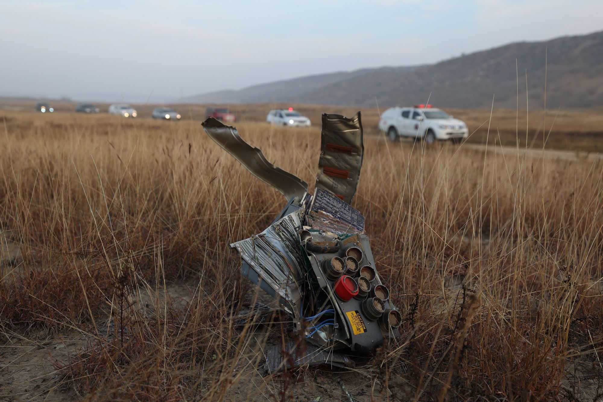 <p>Wreckage is seen at the crash site of the Turkish C-130 military cargo plane</p>