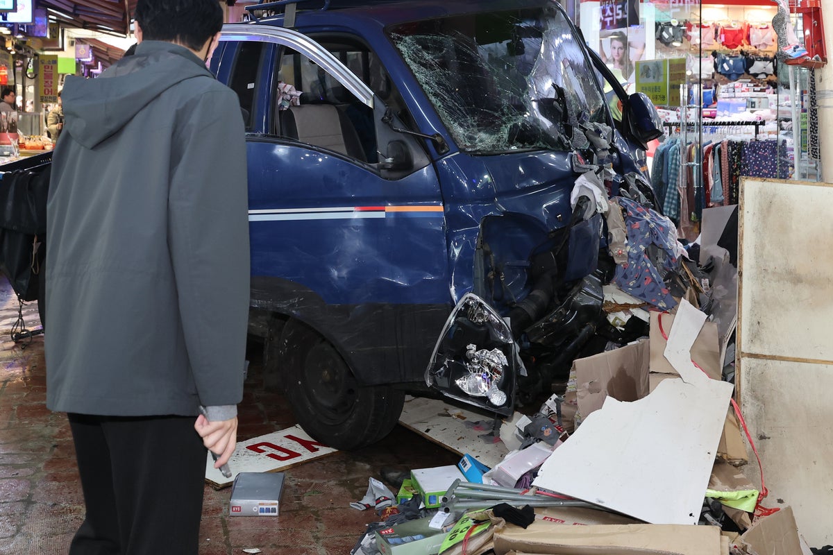 Truck crash in South Korea market kills 2 people and injures 18, officials say