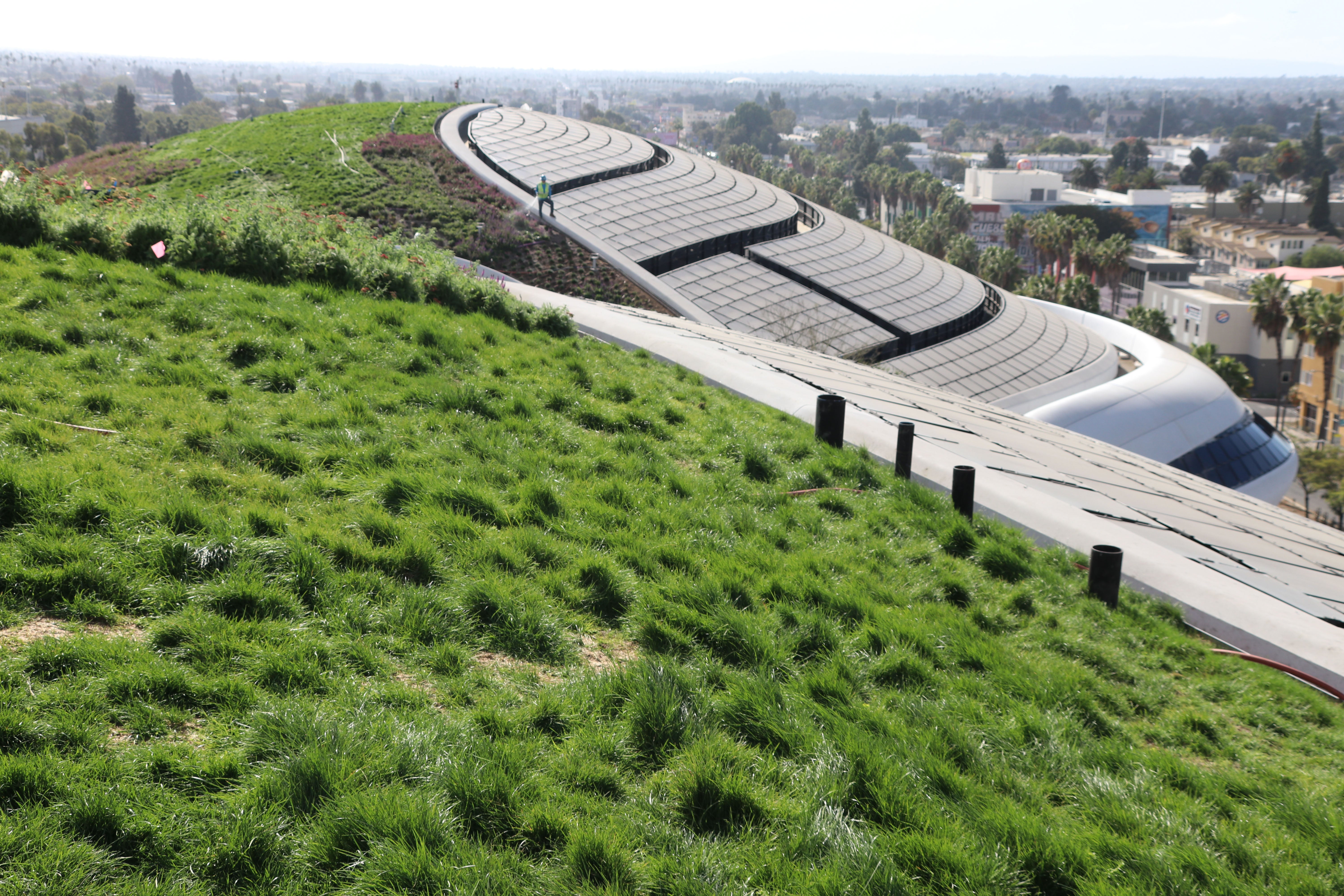 The 300,000 square foot building is set in a landscape of trees, gardens and walking paths and will house what is claimed to be 