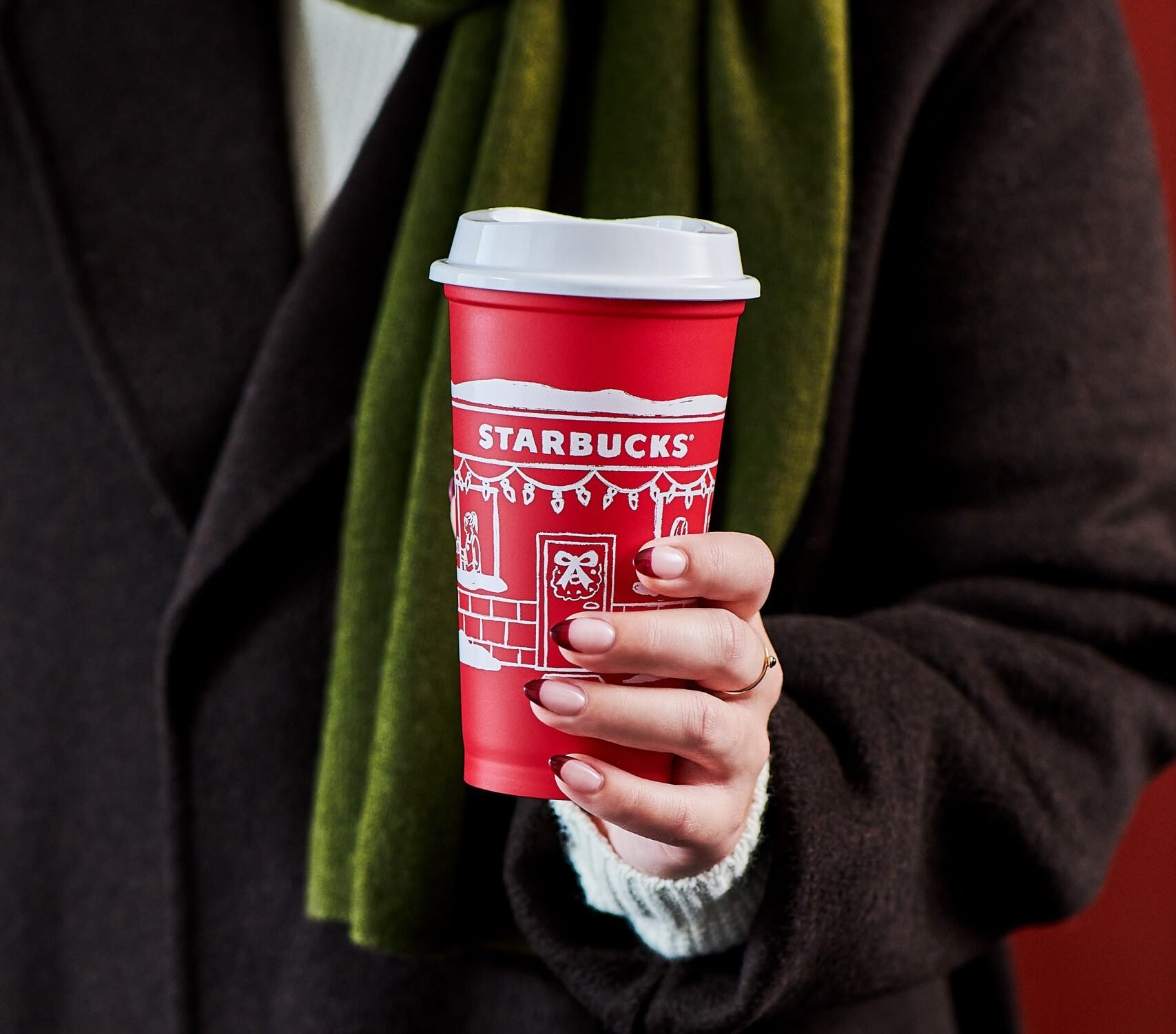 The 2025 Starbucks reusable red cup — free with any holiday beverage purchase