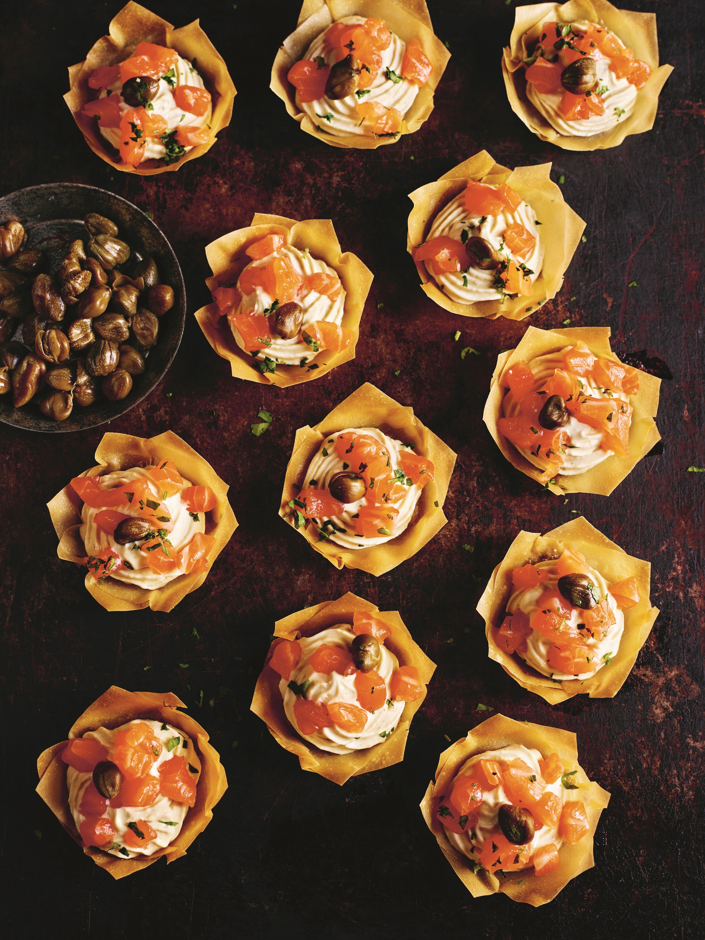 His wasabi-spiked salmon tartlets bring a hit of modern flair to the canapés