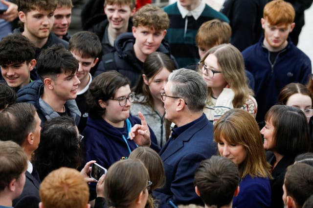 Prime Minister Sir Keir Starmer speaks to students at the engineering workshop at Coleg Menai in Anglesey (Temilade Adelaja/PA)