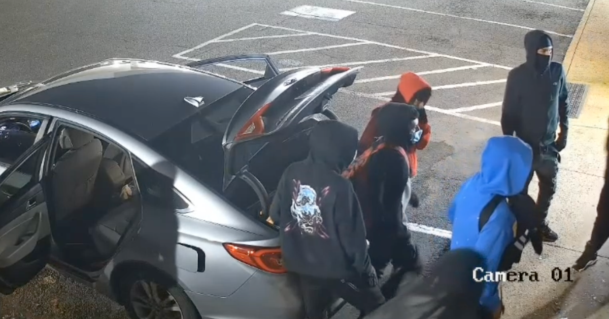 telford vape shop 9 thieves embrace their inner clowns as surveillance footage shows them all  climbing out of tiny car before vape shop heist