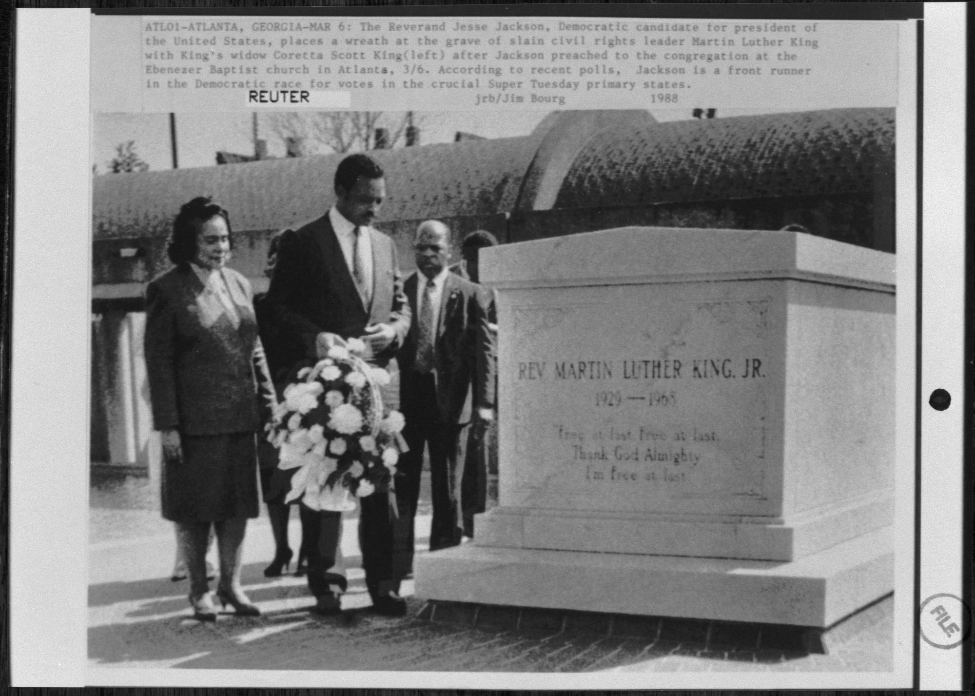 Jackson places a wreath at the grave of Dr Martin Luther King, Jr, with the latter’s widow Coretta King looking on, in Atlanta, Georgia, on March 6, 1988