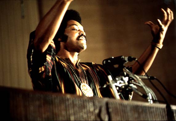 Jackson speaking on a radio broadcast at the headquarters of PUSH in July 1973