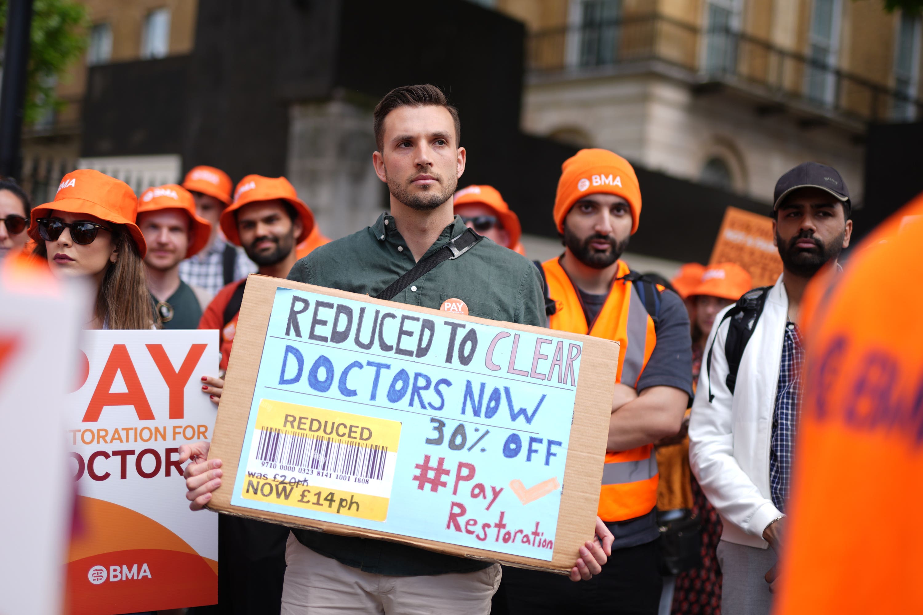 <p>Resident doctors during a protest in June</p>