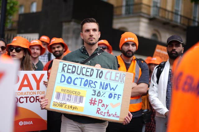 <p>Resident doctors during a protest in June</p>