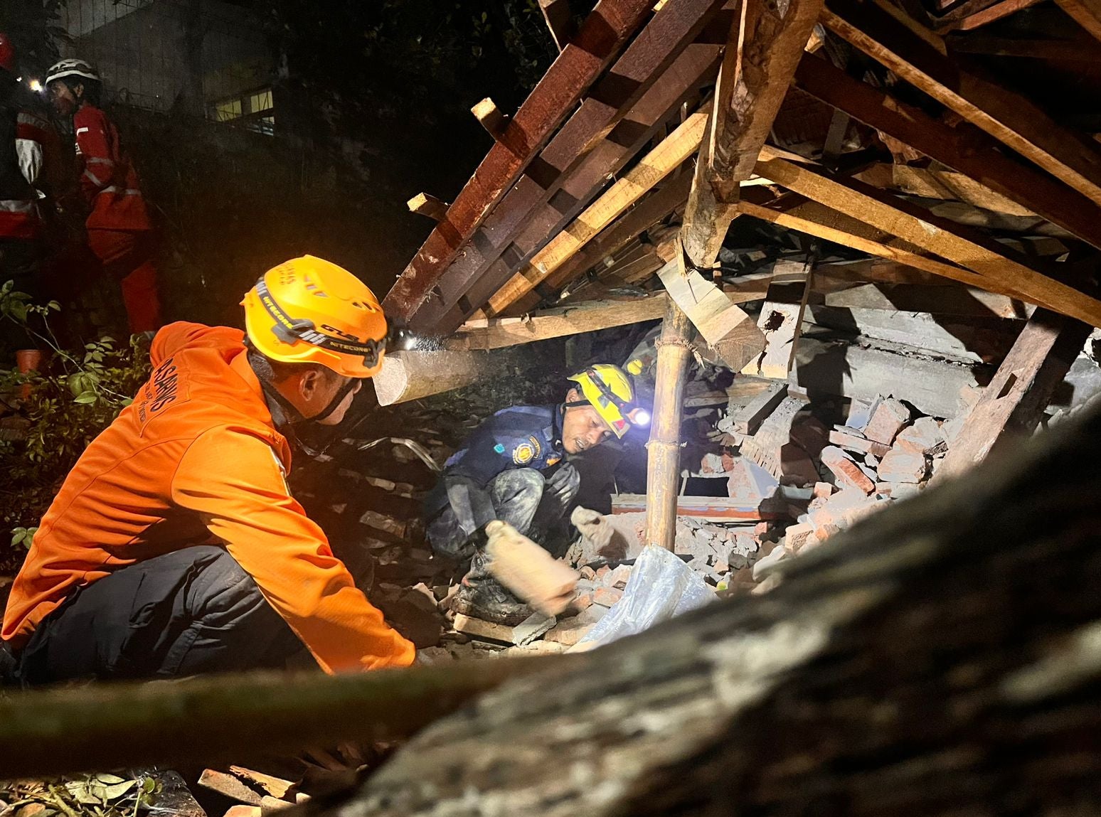 At least two dead and dozens missing after landslides in Indonesia’s ...