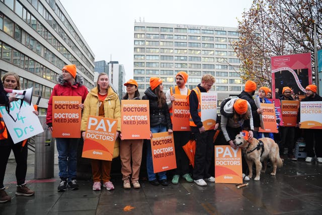 NHS resident doctors outside St Thomas’ Hospital in London (James Manning/PA)