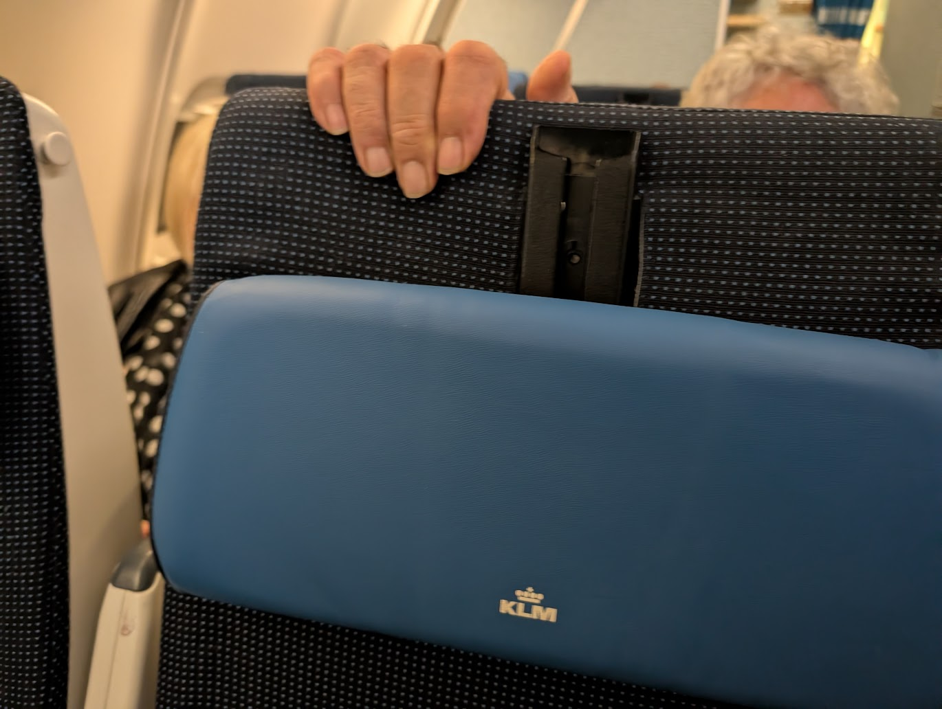 A frequent flier documented the actions of a 'seat grabber' during a transatlantic flight - and sparked an internet discussion.