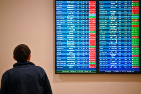 <p>Cancelled flights are seen on a screen at Orlando International Airport in Orlando, Florida on October 30, 2025</p>