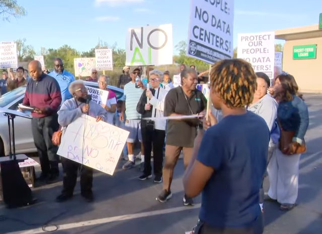 <p>Protesters in Indianapolis gather to demonstrate against a data center planned for the Martindale-Brightwood neighborhood in October. Residents in Tucson, Arizona; Saline Township, Michigan; and in other parts of the country also have been pushing back against planned data center builds, citing concerns about their energy costs and concerns about the environment</p>