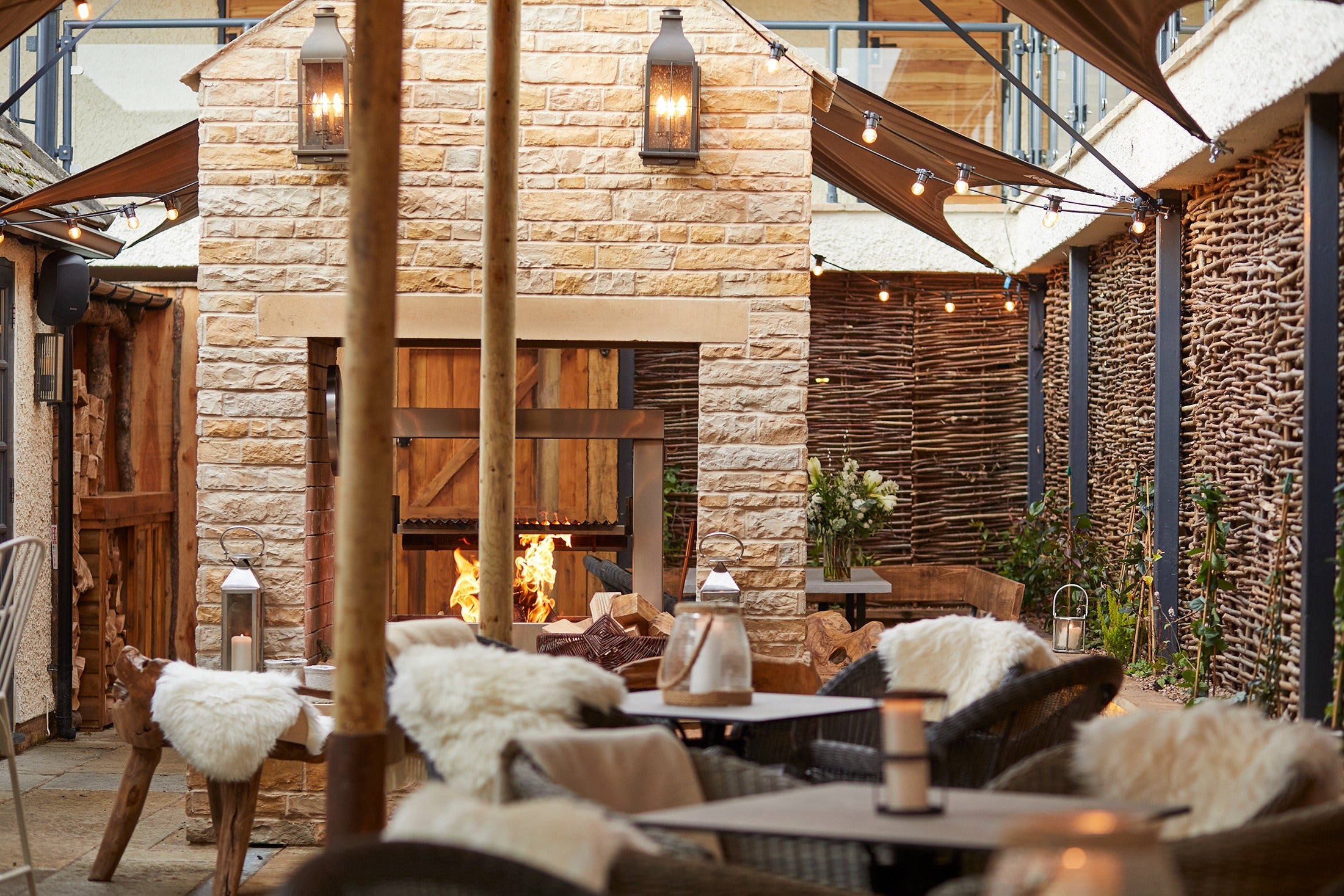 The courtyard of Wild Thyme and Honey where guests can relax by the fire in winter