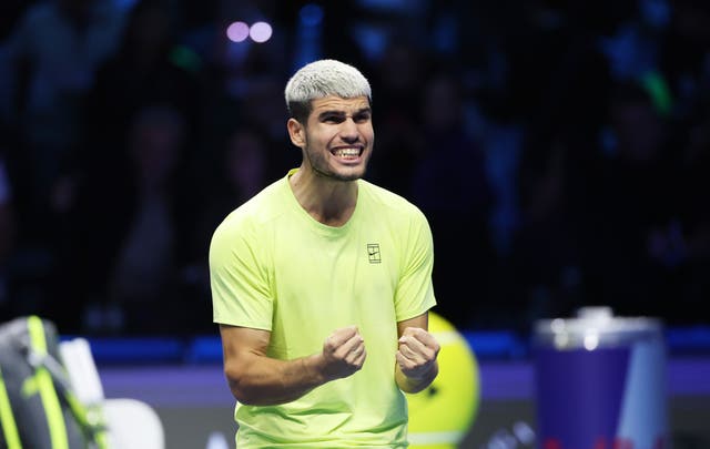 <p>Carlos Alcaraz celebrates after clinching his place in the final</p>
