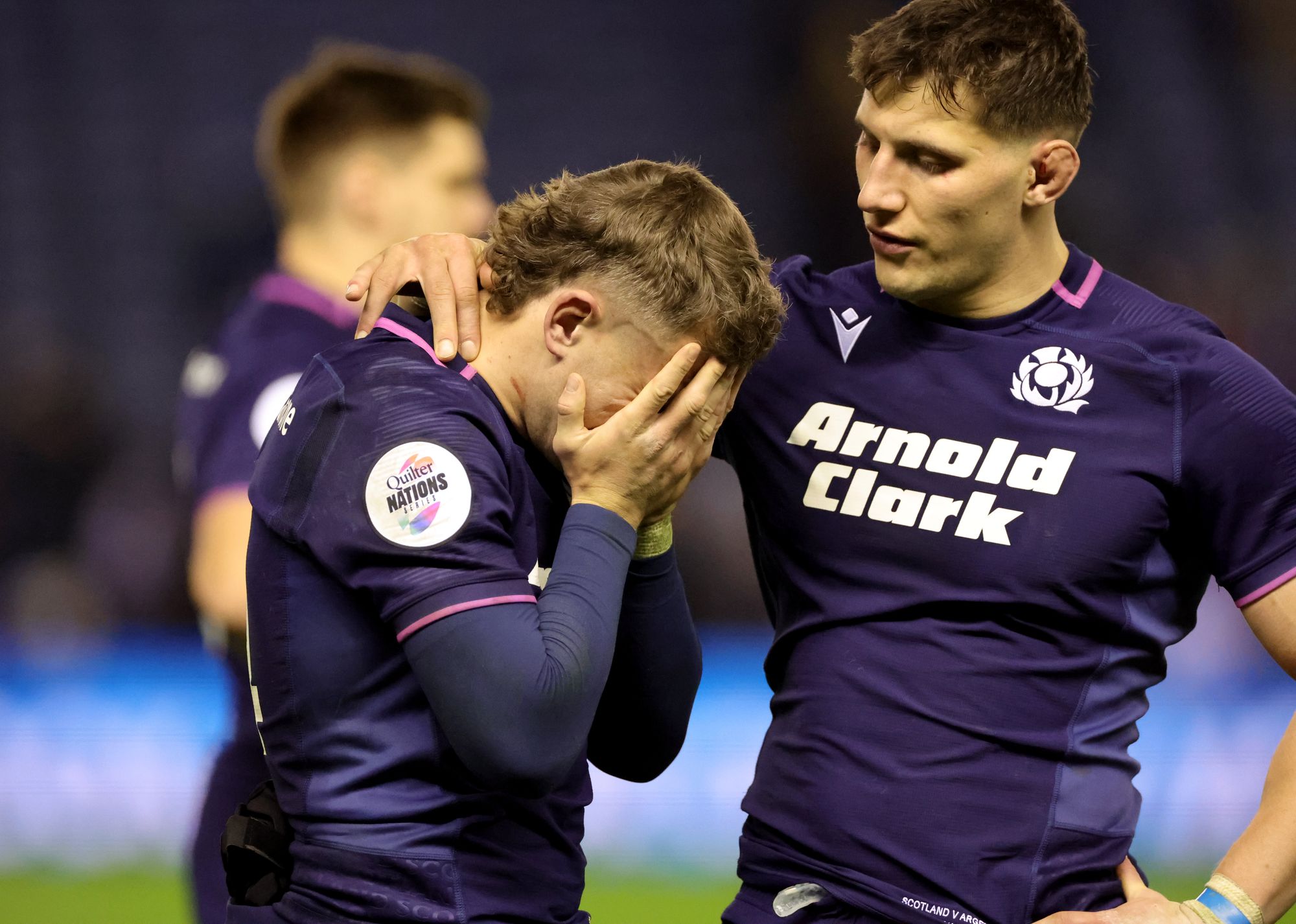 <p>Scotland's Darcy Graham is consoled by Rory Darge after the defeat</p>