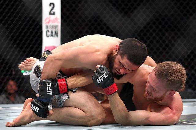 <p>Jack Della Maddalena (right) during his defeat by Islam Makhachev</p>
