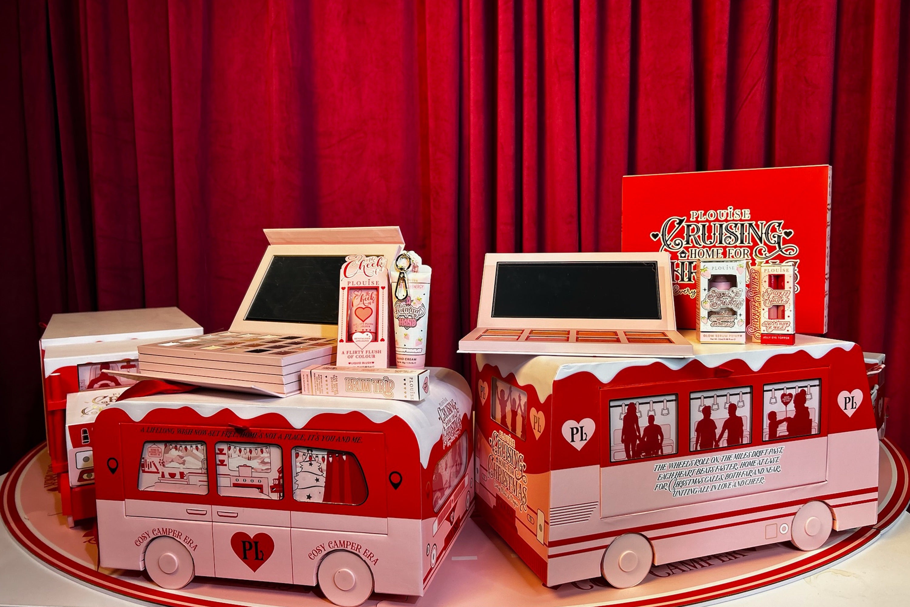 The viral calendar is split across four Christmas-wrapped vehicles