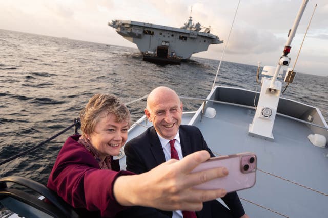Defence Secretary John Healey and Foreign Secretary Yvette Cooper during a visit to HMS Prince of Wales (Stefan Rousseau/PA)