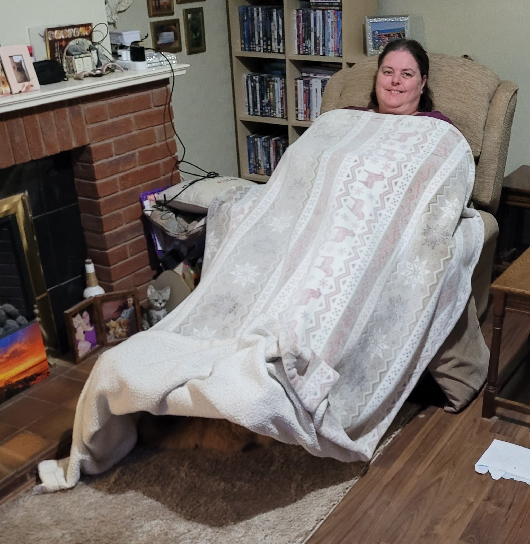 Claire Ferris says she and her husband Gareth can't afford to put the heating on during the winter - and so resort to sitting under blankets in their home