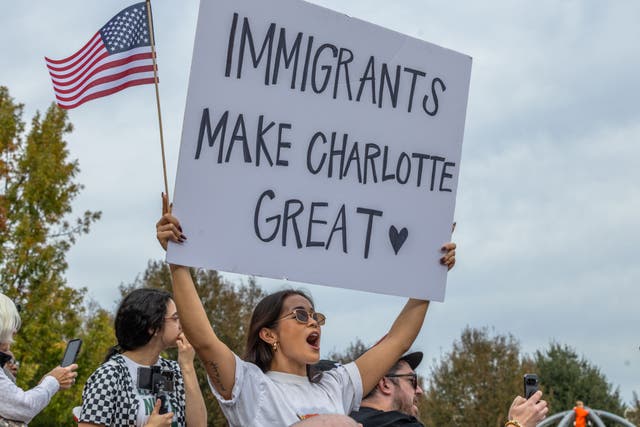 <p>Protesters gather at First Ward Park for the "No Border Patrol In Charlotte" rally</p>