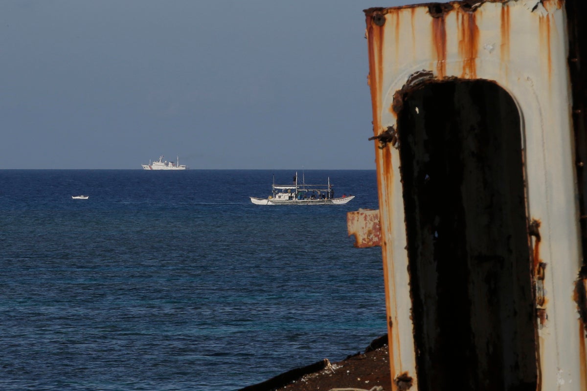 Chinese ship jams communications as Filipino forces deliver supplies to Philippines-occupied shoal