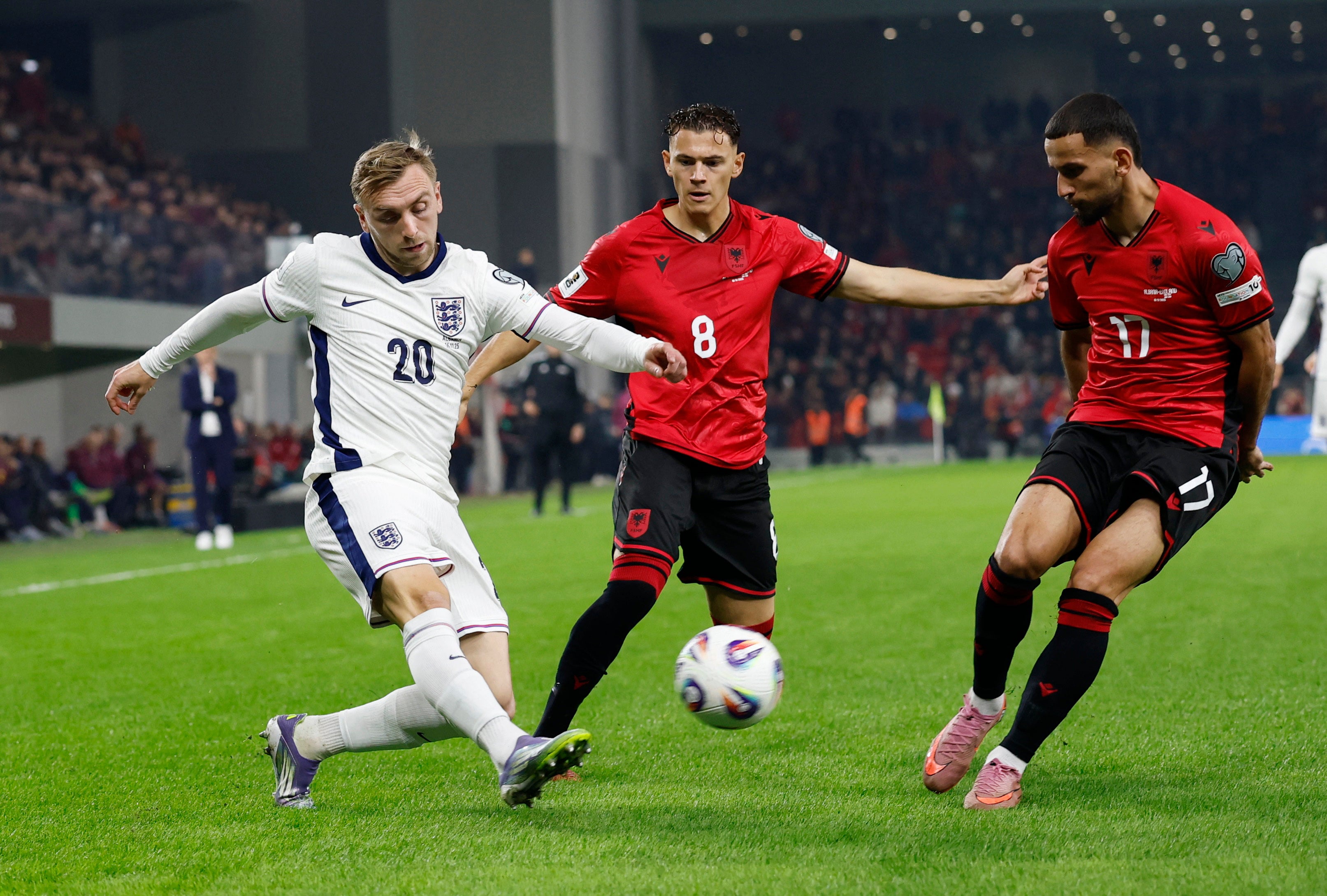 <p>England's Jarrod Bowen in action with Albania's Naser Aliji </p>