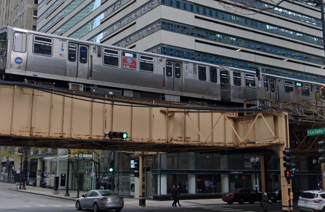 <p>A woman was set on fire by an unnamed attacker on a CTA Blue Line train which was pulling into Clark & Lake station</p>