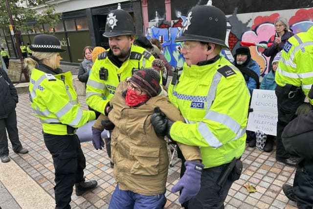 Police remove a protester taking part in a protest in support of Palestine Action in Nottingham (Stephanie Wareham/PA)