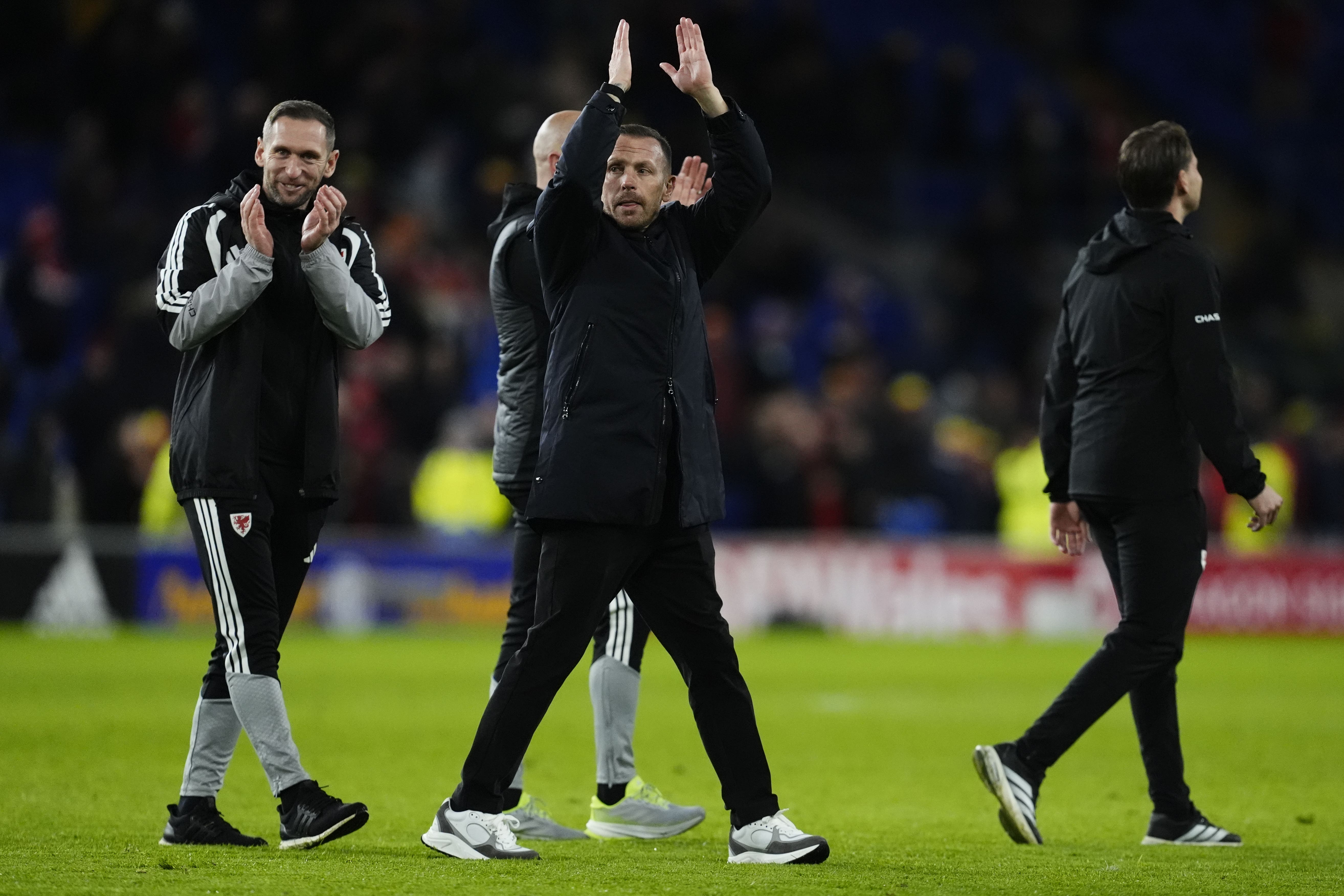 Wales manager Craig Bellamy salutes the crowd at the end of their 7-1 World Cup qualifying victory over North Macedonia (Nick Potts/PA)