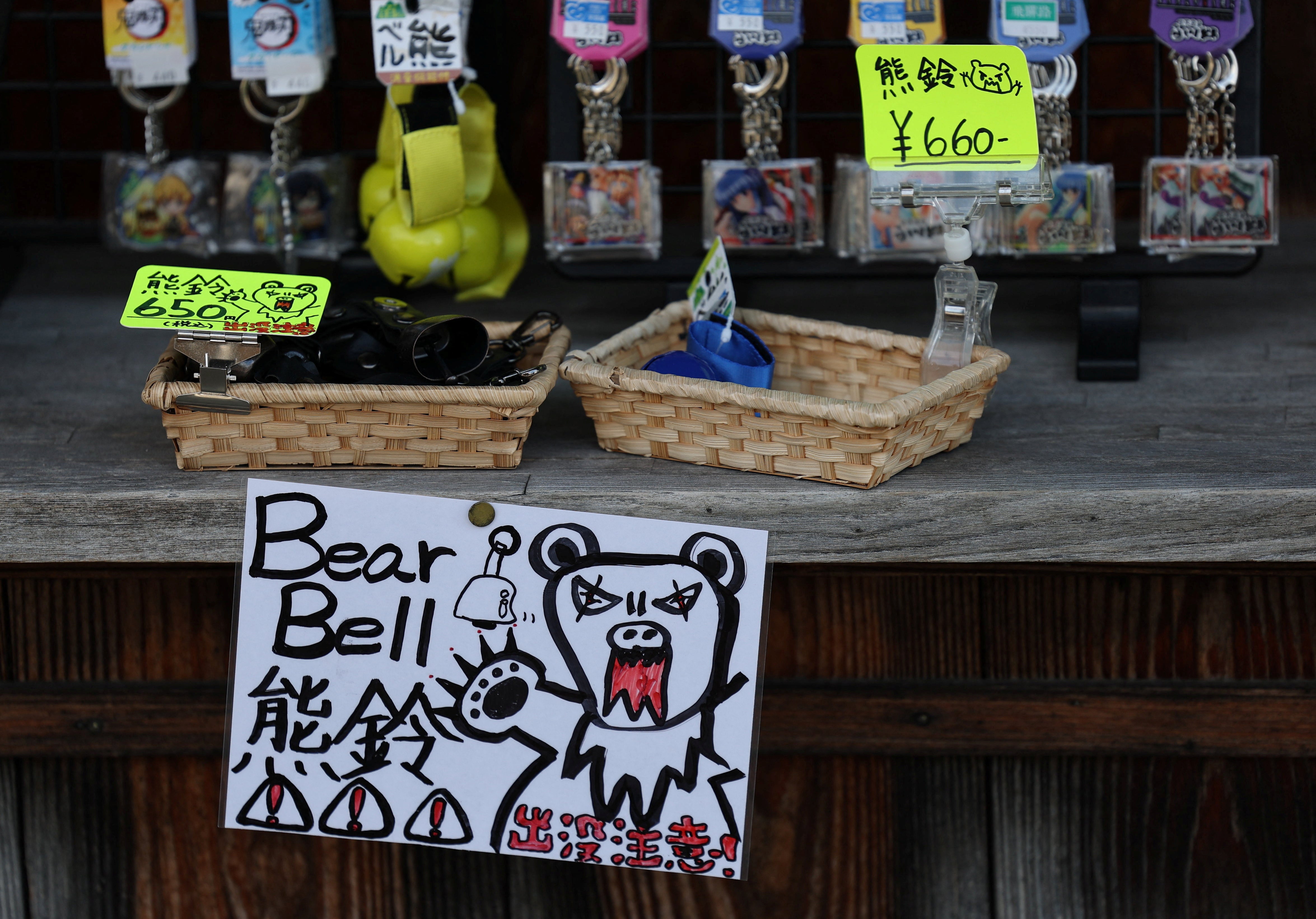 Bear bells are displayed for sale at a souvenir shop at Shirakawa-go, a popular tourist spot and one of Japan's UNESCO World Heritage sites, in Shirakawa village, Gifu Prefecture, Japan, November 15, 2025. REUTERS/Issei Kato