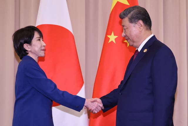 <p>Japan's PM Sanae Takaichi shakes hands with Chinese president Xi Jinping ahead of the Japan-China summit on the sidelines of the Asia-Pacific Economic Cooperation (APEC) Summit in Gyeongju</p>