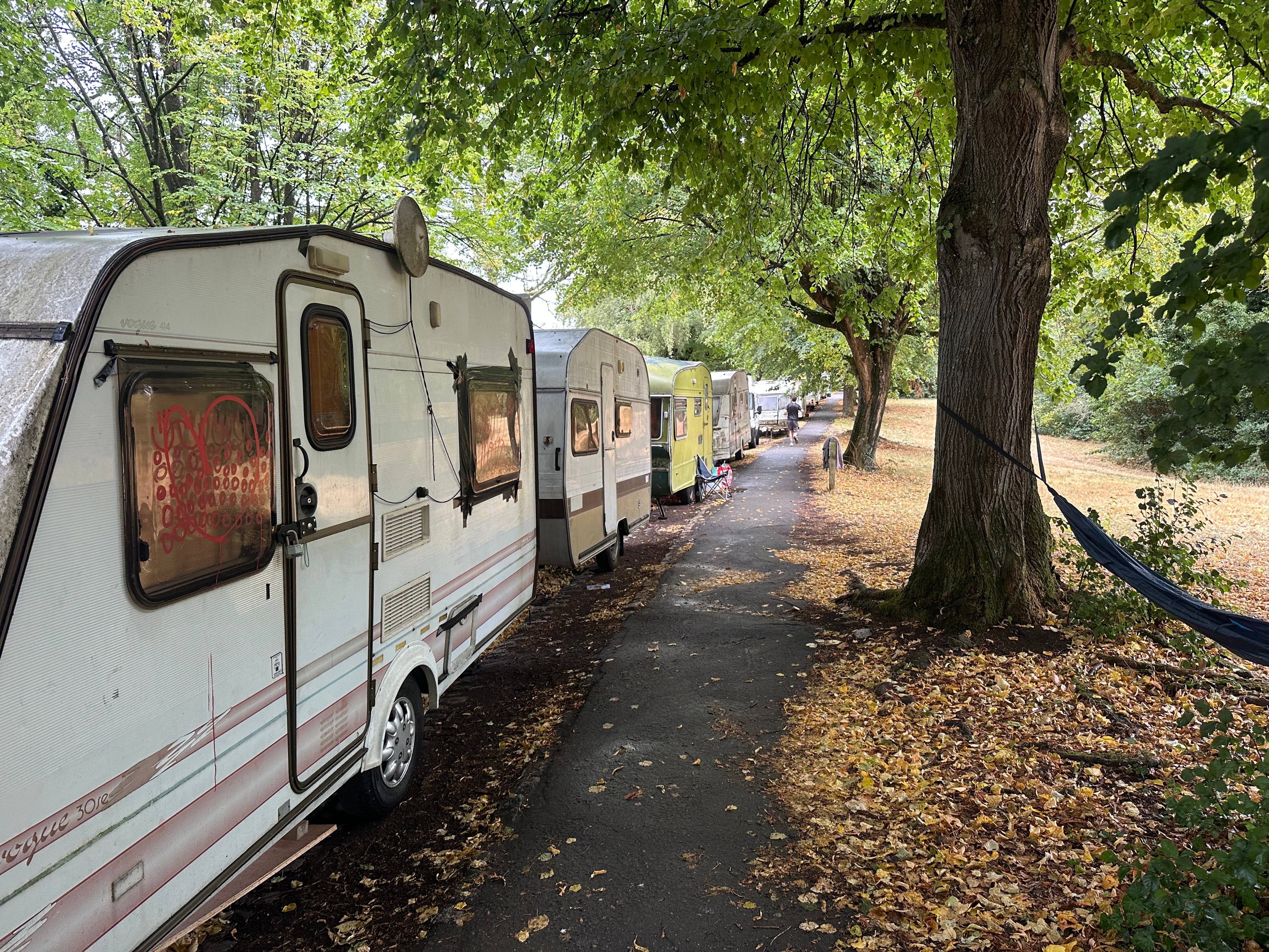 One the of UK's biggest van-dwelling camps to be cleared after park used as toilet'