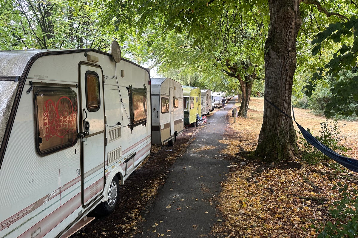 One the of UK's biggest van-dwelling camps to be cleared after park used as toilet'