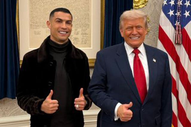<p>Donald Trump has shared a bizarre AI-generated video of himself playing football with Cristiano Ronaldo</p>