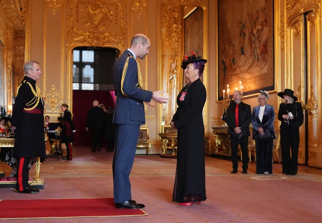 <p>Campaigner Charlotte Charles is made a Member of the Order of the British Empire by the Prince of Wales at Windsor Castle</p>