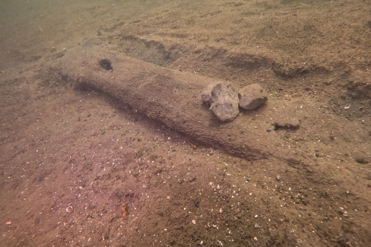 Archaeologists uncover 16 ancient canoes in prehistoric lake &lsquo;parking lot&rsquo;